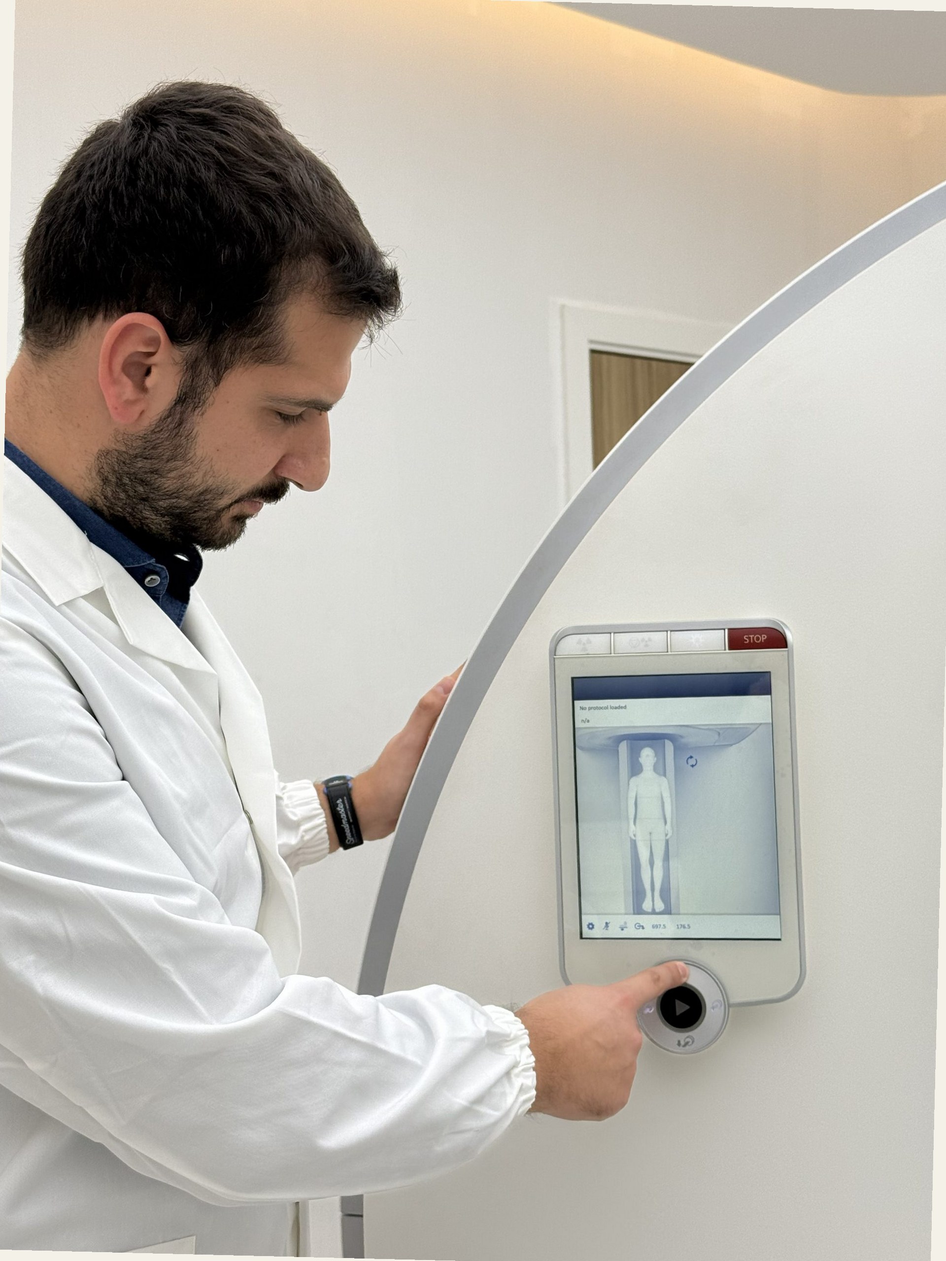 Gemelli doctor using CT scanner interface
